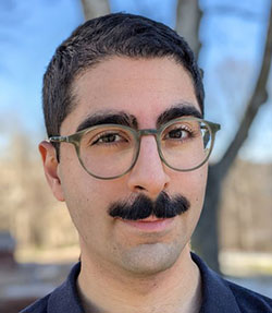Close up portrait of smiling young man.
