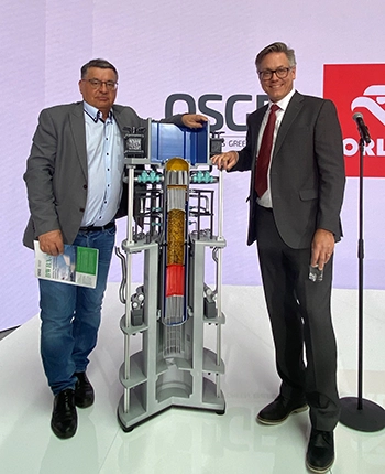 Two men with a reactor modell